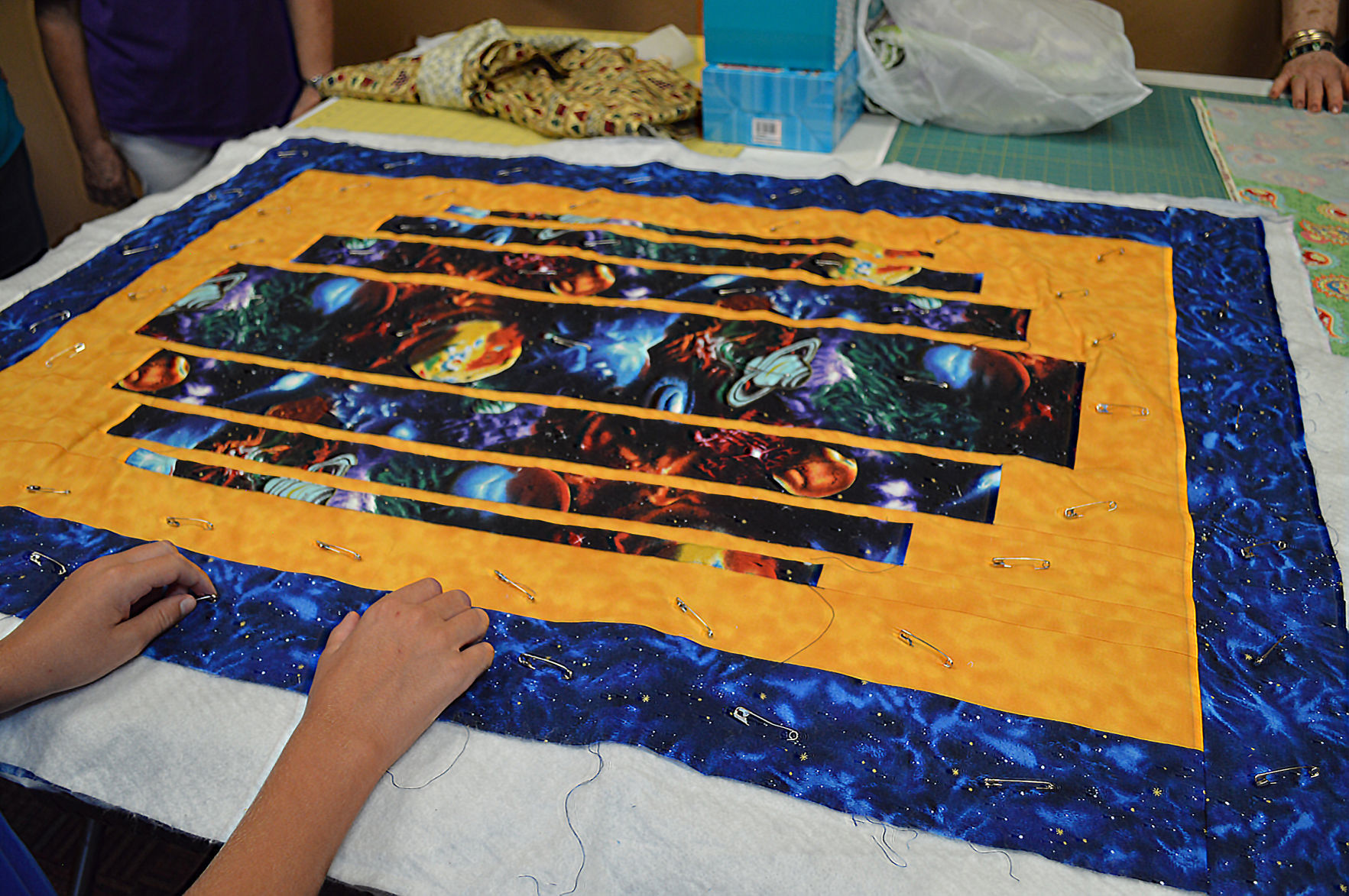 Aviva Divas enjoy camaraderie while sewing for others